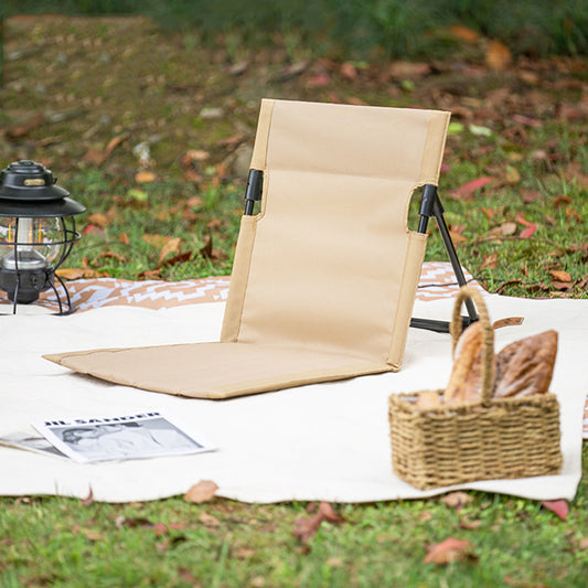 Portable folding seat cushion folded flat for transport